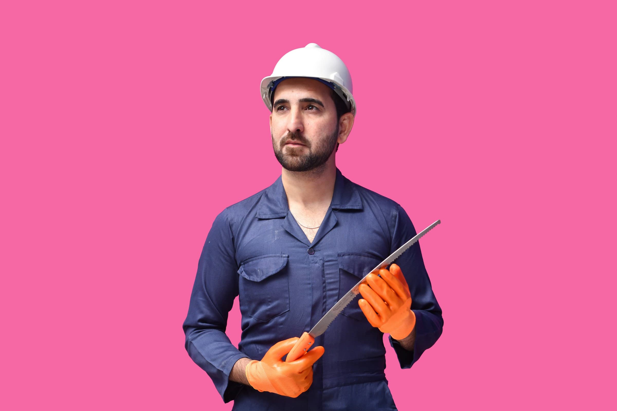 A verified tradesperson in a hard hat and work gloves